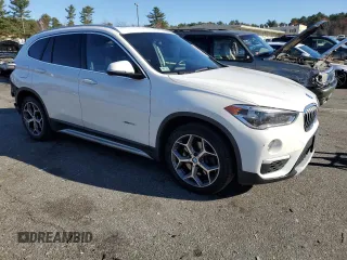2016 BMW X1 xDrive28i with VIN WBXHT3C32G5E52052, listed as a Copart auction lot 79522024 with 76,995 mi miles and Salvage Title. Bid and sale history available at carsss.com. Image 4.