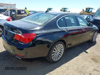 2012 BMW 7 Series 750i with VIN WBAKA8C50CCY37892, listed as a IAAI auction lot 42080313 with 148,058 mi miles. Bid and sale history available at carsss.com. Image 4.