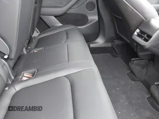 2024 Tesla Model Y с VIN 7SAYGDED5RF093696, выставлен на аукционе IAAI как лот 42061020 с пробегом 21 220 миль миль и . История ставок и продаж доступна на DreamBid. Изображение 8.