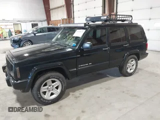 2001 Jeep Cherokee Sport z VIN 1J4FF58S11L562933, wystawiony jako IAAI lot #41944672 z przebiegiem 163 078 mil mil oraz . Historia ofert i sprzedaży dostępna na DreamBid. Obrazek 2.