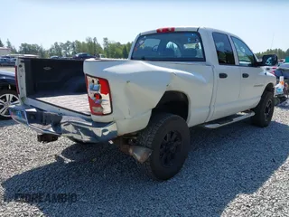 2005 Dodge 2500 SLT z VIN 3D7KS28CX5G853026, wystawiony jako IAAI lot #42408623 z przebiegiem 241 223 mil mil oraz . Historia ofert i sprzedaży dostępna na DreamBid. Obrazek 4.