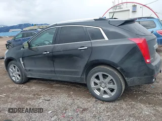2012 Cadillac SRX Performance Collection with VIN 3GYFNBE38CS630415, listed as a IAAI auction lot 41753419 with 130,436 mi miles. Bid and sale history available at carsss.com. Image 14.