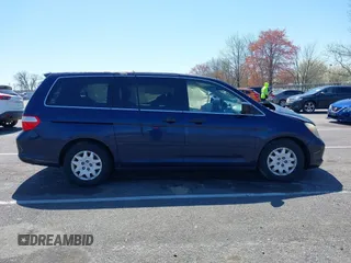 2007 Honda Odyssey LX with VIN 5FNRL38277B098798, listed as a IAAI auction lot 41998802 with 205,657 mi miles and . Bid and sale history available at carsss.com. Image 13.