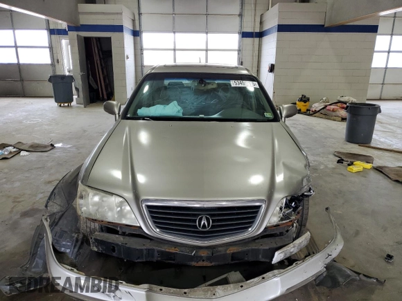 2002 Acura RL z VIN JH4KA96542C007840, wystawiony jako Copart lot #53459615 z przebiegiem Nie podano mil oraz Szkoda całkowita • Salvage title. Historia ofert i sprzedaży dostępna na DreamBid. Obrazek 5.