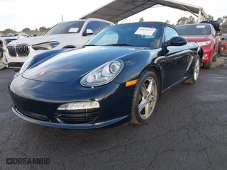 2012 Porsche Boxster with VIN WP0CA2A8XCS710347, listed as a IAAI auction lot 41212971 with 75,385 mi miles. Bid and sale history available at carsss.com. Image 2.