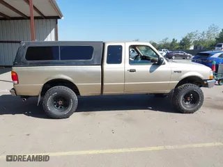 1999 Ford Ranger XL with VIN 1FTYR14X9XTA59675, listed as a IAAI auction lot 41861165 with 208,928 mi miles. Bid and sale history available at carsss.com. Image 13.