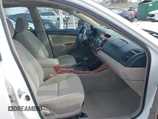 2003 Toyota Camry LE with VIN 4T1BE32K13U250477, listed as a IAAI auction lot 41996101 with 212,951 mi miles and . Bid and sale history available at DreamBid. Image 5.