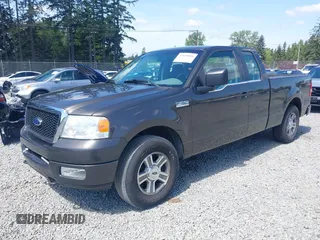 2005 Ford F-150 STX with VIN 1FTRX14W35FB18409, listed as a IAAI auction lot 42140190 with 209,198 mi miles and . Bid and sale history available at carsss.com. Image 2.