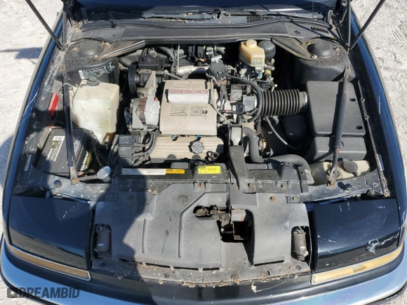 1988 Buick Reatta with VIN 1G4EC11C4JB901062, listed as a Copart auction lot 80058294 with 64,033 mi miles and Salvage Title. Bid and sale history available at carsss.com. Image 11.