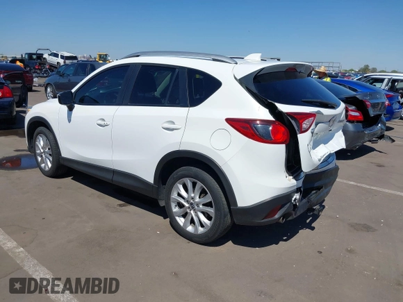 2015 Mazda CX-5 Grand Touring with VIN JM3KE2DYXF0493370, listed as a IAAI auction lot 42087156 with 161,464 mi miles. Bid and sale history available at carsss.com. Image 3.