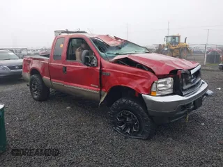 2003 Ford Super Duty F-250 XL with VIN 1FTNX21P23EC80066, listed as a IAAI auction lot 41008539 with 113,928 mi miles. Bid and sale history available at carsss.com. Image 1.