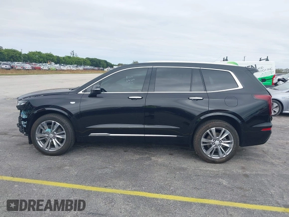 2023 Cadillac XT6 FWD Premium Luxury with VIN 1GYKPCRS6PZ106284, listed as a IAAI auction lot 41595617 with 32,795 mi miles and . Bid and sale history available at DreamBid. Image 15.