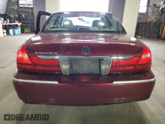 2004 Mercury Grand Marquis GS with VIN 2MEFM74W24X627374, listed as a Copart auction lot 50508605 with 118,635 mi miles and Salvage Title. Bid and sale history available at DreamBid. Image 6.