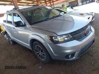 2018 Dodge Journey SXT z VIN 3C4PDCBG0JT512294, wystawiony jako IAAI lot #42243600 z przebiegiem 85 602 mil mil oraz . Historia ofert i sprzedaży dostępna na DreamBid. Obrazek 1.