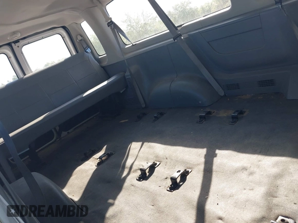 2004 Ford Econoline Passenger XL with VIN 1FBSS31L04HB18896, listed as a IAAI auction lot 42038029 with 252,825 mi miles. Bid and sale history available at carsss.com. Image 8.
