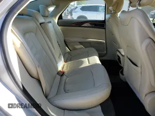 2015 Lincoln MKZ z VIN 3LN6L2G95FR603693, wystawiony jako Copart lot #53362845 z przebiegiem 171 107 mil mil oraz Szkoda całkowita • Salvage title. Historia ofert i sprzedaży dostępna na DreamBid. Obrazek 10.