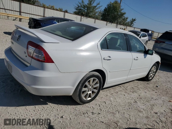2006 Mercury Milan с VIN 3MEFM07146R600606, выставлен на аукционе Copart как лот 76766344 с пробегом 75 408 миль миль и Списание • Salvage title. История ставок и продаж доступна на DreamBid. Изображение 3.