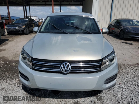 2012 Volkswagen Tiguan SE z VIN WVGAV7AX0CW509206, wystawiony jako Copart lot #52226395 z przebiegiem 108 922 mil mil oraz Szkody całkowita. Historia ofert i sprzedaży dostępna na DreamBid. Obrazek 5.