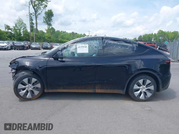 2023 Tesla Model Y Long Range with VIN 7SAYGDEE6PA166514, listed as a IAAI auction lot 41359540 with 16,271 mi miles. Bid and sale history available at carsss.com. Image 14.