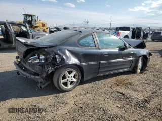 2001 Pontiac Grand Am GT with VIN 1G2NW12E31M584119, listed as a Copart auction lot 76099984 with 293,559 mi miles and Clean Title. Bid and sale history available at carsss.com. Image 3.