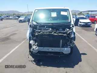 2020 Ford Transit Passenger XL with VIN 1FMZK1Y89LKB17761, listed as a IAAI auction lot 39455768 with 73,654 mi miles and . Bid and sale history available at DreamBid. Image 13.