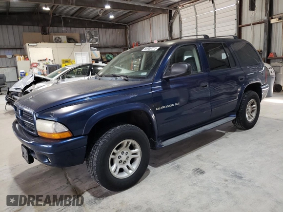 2001 Dodge Durango with VIN 1B4HS28N71F521236, listed as a Copart auction lot 56939715 with 199,223 mi miles and Clean title. Bid and sale history available at DreamBid. Image 1.