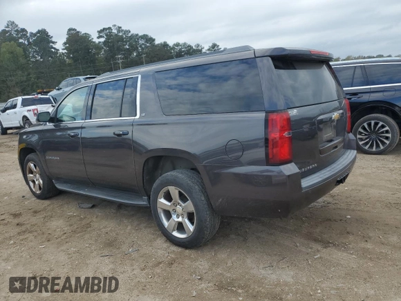 2016 Chevrolet Suburban LT with VIN 1GNSCHKCXGR464772, listed as a Copart auction lot 80065134 with 79,706 mi miles and Salvage Title. Bid and sale history available at carsss.com. Image 2.
