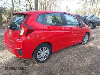 2016 Honda Fit LX with VIN JHMGK5H50GX026412, listed as a IAAI auction lot 41918360 with 130,805 mi miles. Bid and sale history available at carsss.com. Image 4.