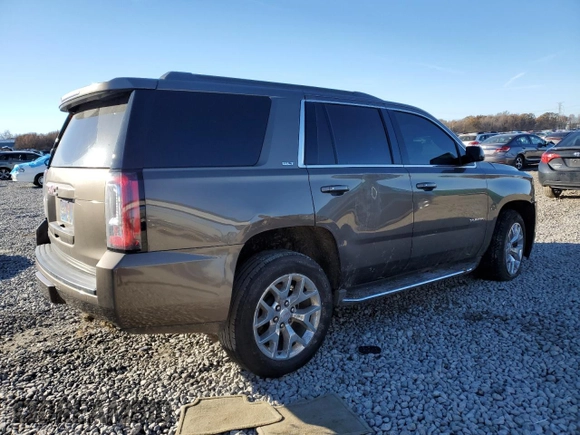 2015 GMC Yukon SLT with VIN 1GKS1BKC8FR664001, listed as a Copart auction lot 84391784 with 0 mi miles and Salvage Title. Bid and sale history available at carsss.com. Image 3.