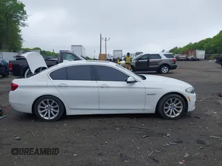 2014 BMW 5 Series 535i xDrive with VIN WBA5B3C57ED538801, listed as a IAAI auction lot 42246097 with 170,219 mi miles and . Bid and sale history available at DreamBid. Image 12.