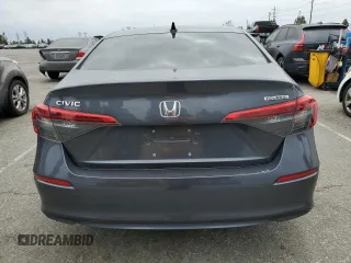 2022 Honda Civic Touring z VIN 2HGFE1F93NH314236, wystawiony jako Copart lot #53380915 z przebiegiem 25 302 mil mil oraz Szkoda całkowita • Salvage title. Historia ofert i sprzedaży dostępna na DreamBid. Obrazek 6.