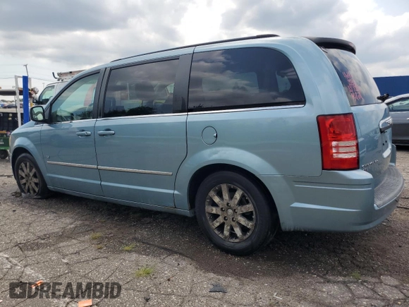 2009 Chrysler Town & Country Touring with VIN 2A8HR54X39R667914, listed as a Copart auction lot 66010904 with 214,583 mi miles and Salvage Title. Bid and sale history available at DreamBid. Image 2.