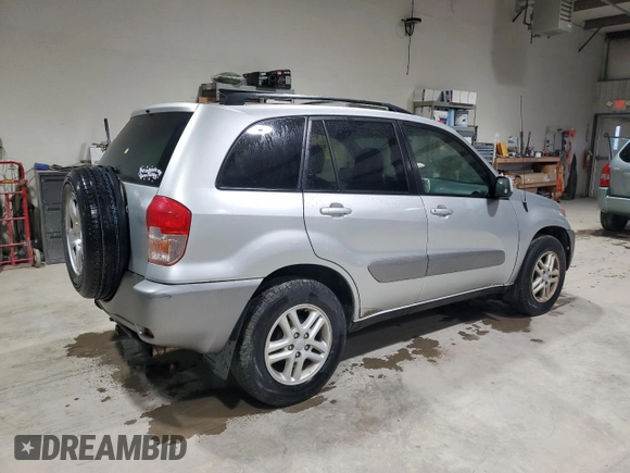 2001 Toyota RAV4 z VIN JTEGH20V610015422, wystawiony jako Copart lot #57053185 z przebiegiem 197 829 mil mil oraz Szkoda całkowita • Salvage title. Historia ofert i sprzedaży dostępna na DreamBid. Obrazek 3.