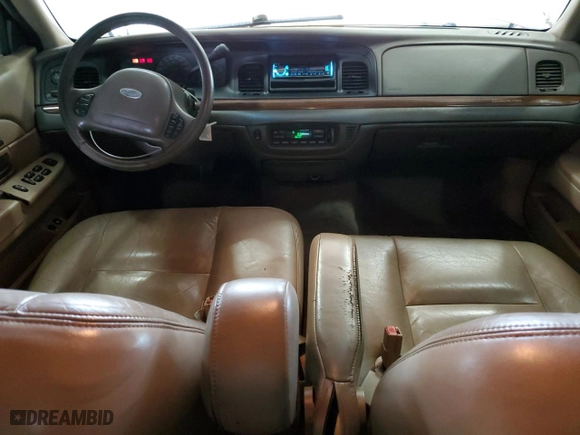 2003 Ford Crown Victoria LX with VIN 2FAFP74W23X134274, listed as a Copart auction lot 73295754 with 212,581 mi miles and Salvage Title. Bid and sale history available at carsss.com. Image 8.