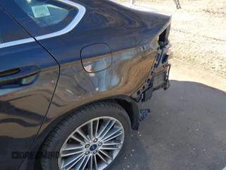 2013 Ford Fusion SE with VIN 3FA6P0HR2DR191084, listed as a IAAI auction lot 41640526 with 56,868 mi miles and . Bid and sale history available at DreamBid. Image 6.