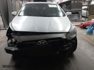 2013 Hyundai Accent GL with VIN KMHCT5AE3DU104651, listed as a IAAI auction lot 41522571 with 147,324 mi miles. Bid and sale history available at carsss.com. Image 12.