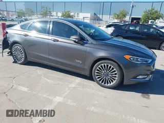 2018 Ford Fusion Energi Titanium with VIN 3FA6P0SU5JR111012, listed as a IAAI auction lot 41862545 with 223,209 mi miles. Bid and sale history available at carsss.com. Image 1.