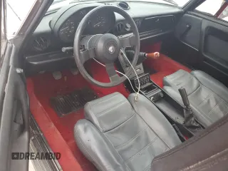 1990 Alfa Romeo Spider z VIN ZARBA12T0L6002373, wystawiony jako Copart lot #75362404 z przebiegiem 73 479 mil mil oraz Nie do naprawy • Non repairable. Historia ofert i sprzedaży dostępna na DreamBid. Obrazek 8.
