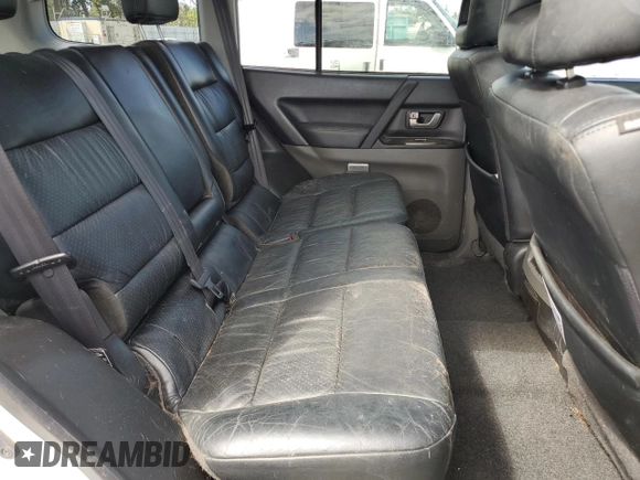 2003 Mitsubishi Montero Limited z VIN JA4NW51S23J042311, wystawiony jako Copart lot #54429895 z przebiegiem 119 138 mil mil oraz Szkoda całkowita • Salvage title. Historia ofert i sprzedaży dostępna na DreamBid. Obrazek 11.