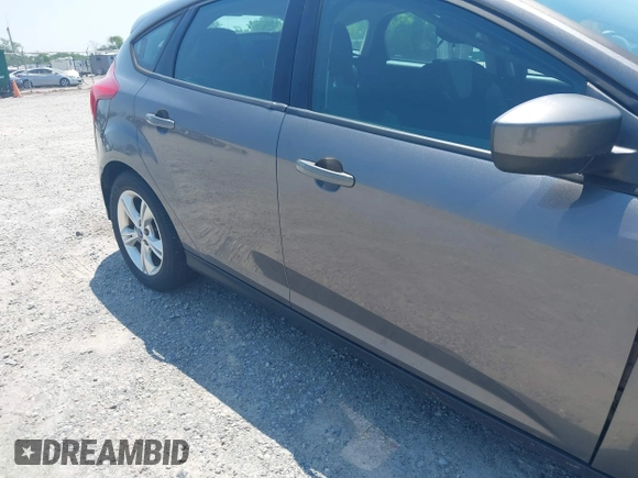 2012 Ford Focus SE z VIN 1FAHP3K28CL229646, wystawiony jako IAAI lot #42491915 z przebiegiem 174 105 mil mil oraz . Historia ofert i sprzedaży dostępna na DreamBid. Obrazek 15.