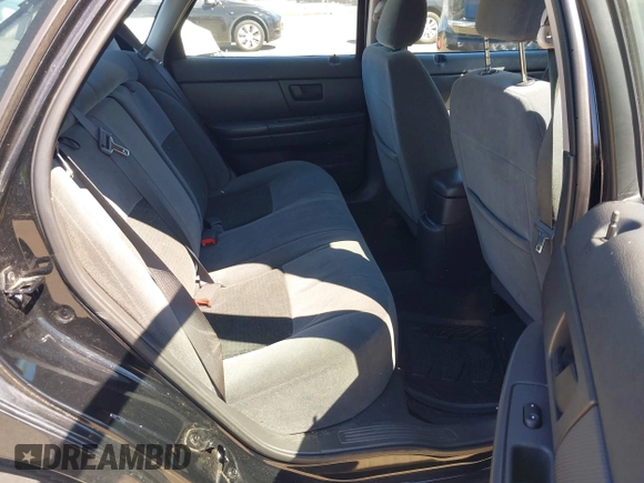 2005 Ford Taurus SE with VIN 1FAFP53255A228082, listed as a IAAI auction lot 42183671 with 95,382 mi miles and . Bid and sale history available at DreamBid. Image 8.