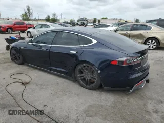 2014 Tesla Model S 60 with VIN 5YJSA1H16EFP51363, listed as a Copart auction lot 59960075 with 106,338 mi miles and Clean title. Bid and sale history available at DreamBid. Image 2.