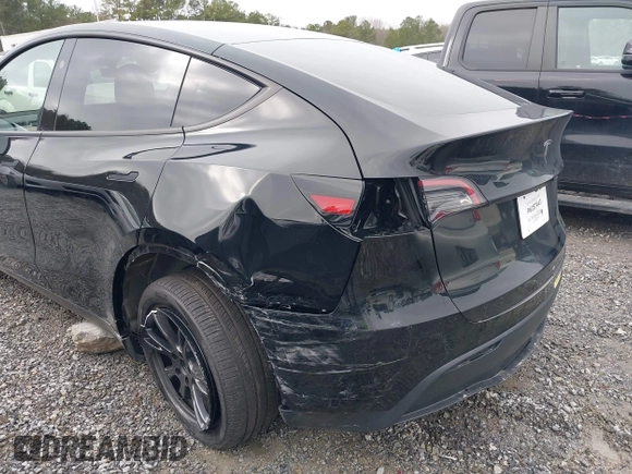 2025 Tesla Model Y Long Range with VIN 7SAYGDEDXSA349480, listed as a IAAI auction lot 41492740 with 1,486 mi miles and . Bid and sale history available at DreamBid. Image 6.