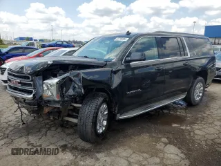 2015 GMC Yukon XL SLE with VIN 1GKS2GKC1FR233834, listed as a Copart auction lot 62796684 with 160,699 mi miles and Clean Title. Bid and sale history available at carsss.com. Image 1.