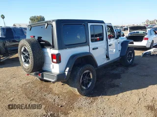 2019 Jeep Wrangler Unlimited Rubicon with VIN 1C4HJXFN7KW505383, listed as a IAAI auction lot 41220907 with 53,578 mi miles and . Bid and sale history available at DreamBid. Image 4.