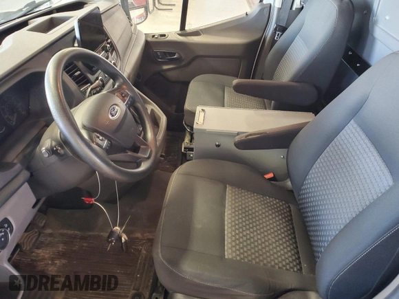 2020 Ford Transit Cargo with VIN 1FTBR2YG0LKA26098, listed as a IAAI auction lot 42905476 with 99,706 mi miles and . Bid and sale history available at DreamBid. Image 19.