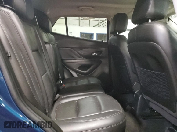 2020 Buick Encore Essence z VIN KL4CJGSB9LB033504, wystawiony jako Copart lot #43911325 z przebiegiem 62 471 mil mil oraz Szkody całkowita. Historia ofert i sprzedaży dostępna na DreamBid. Obrazek 12.