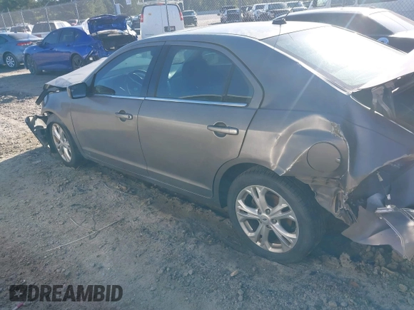 2012 Ford Fusion SE with VIN 3FAHP0HA9CR428400, listed as a IAAI auction lot 42556569 with 205,285 mi miles and . Bid and sale history available at DreamBid. Image 3.