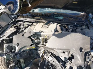 2014 Infiniti Q50 with VIN JN1BV7APXEM692303, listed as a IAAI auction lot 41325631 with 115,803 mi miles. Bid and sale history available at carsss.com. Image 10.