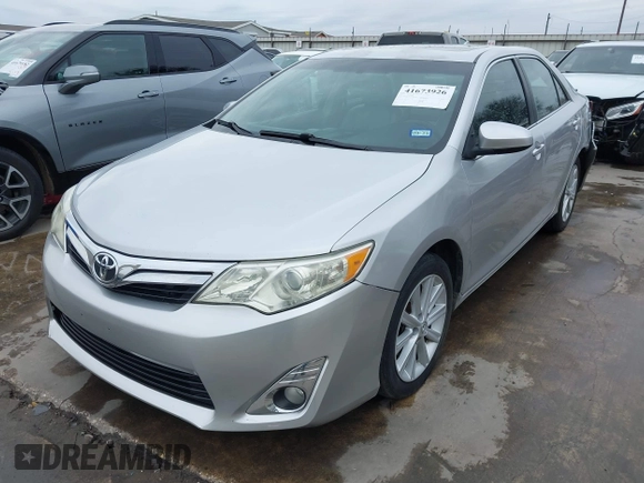 2014 Toyota Camry SE with VIN 4T1BK1FK7EU540975, listed as a IAAI auction lot 41673926 with 190,036 mi miles. Bid and sale history available at carsss.com. Image 2.